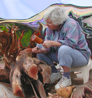 Penelope roughing a piece of Manzanita root